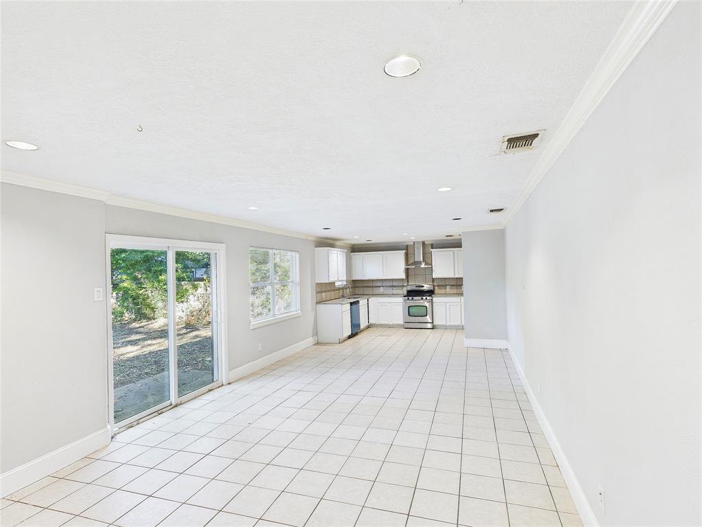 6909 Valhalla Road Fort Worth, TX 76116 - Photo 2 of 15 a view of a kitchen with a sink and a window