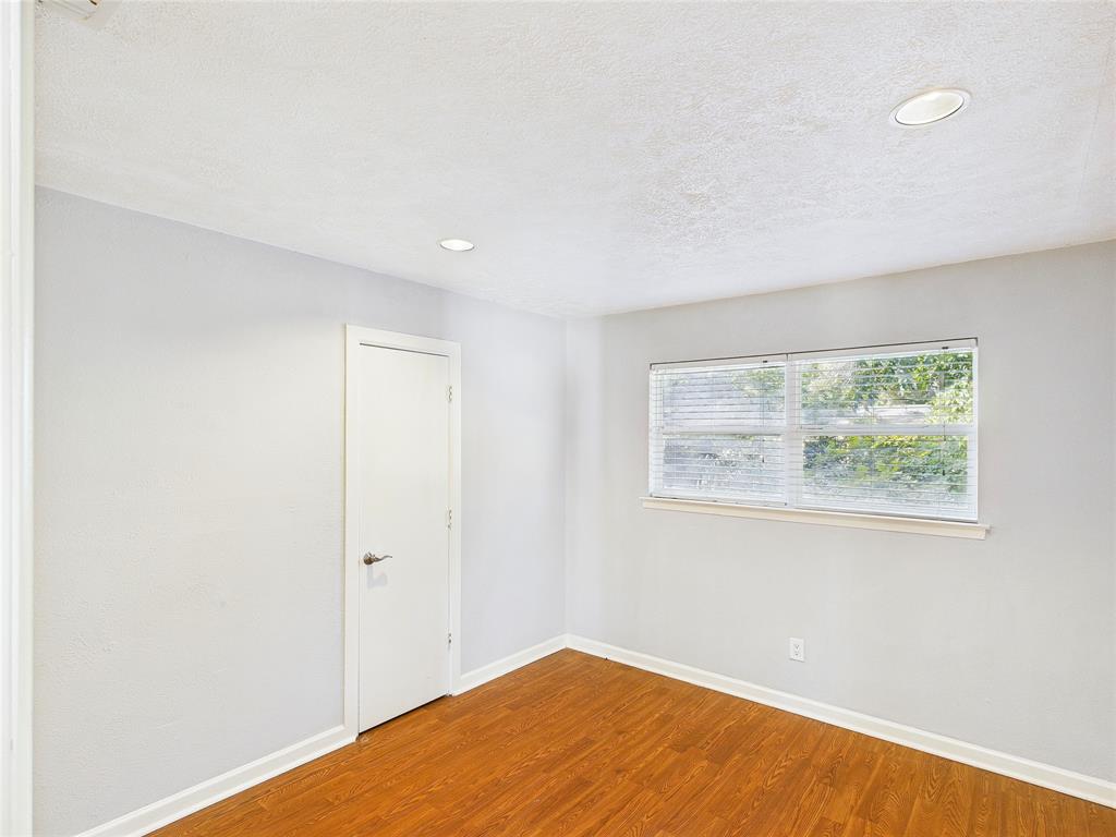 6909 Valhalla Road Fort Worth, TX 76116 - Photo 5 of 15 an empty room with a window