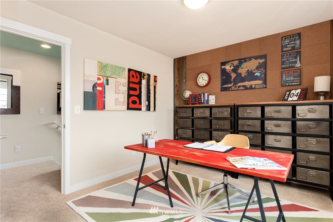 443 Partlon Street, Unit 75 Buckley, WA 98321 - Photo 11 of 25 a room with furniture and rug