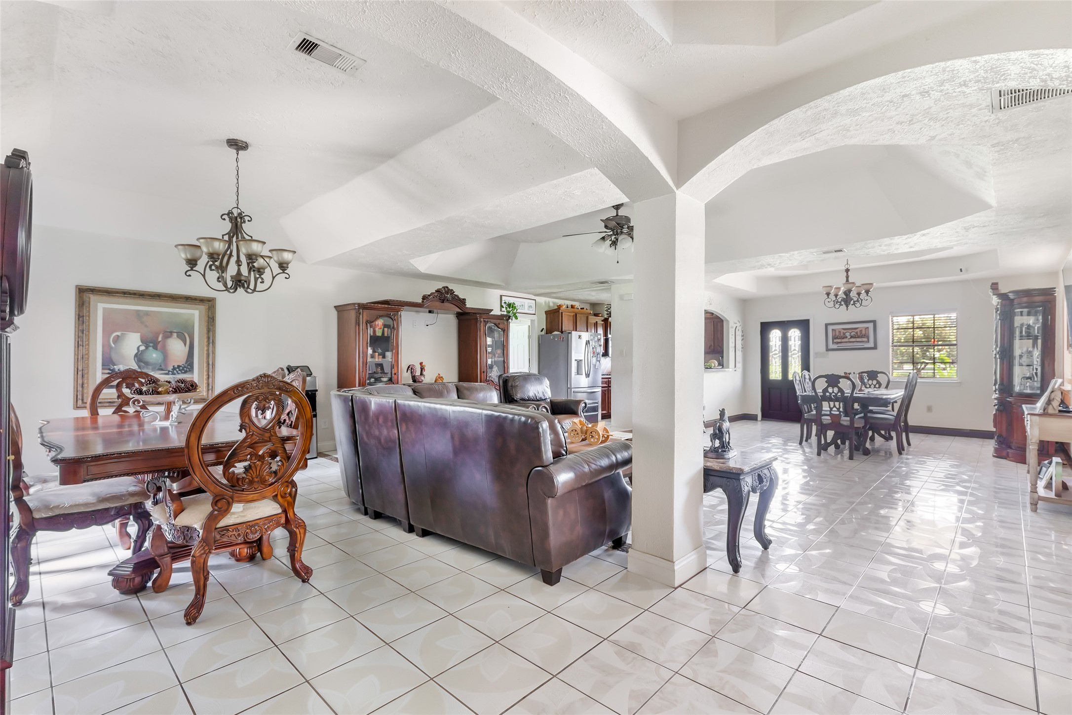 15123 Lindstrom Road Crosby, TX 77532 - Photo 14 of 39 a living room with furniture and a chandelier