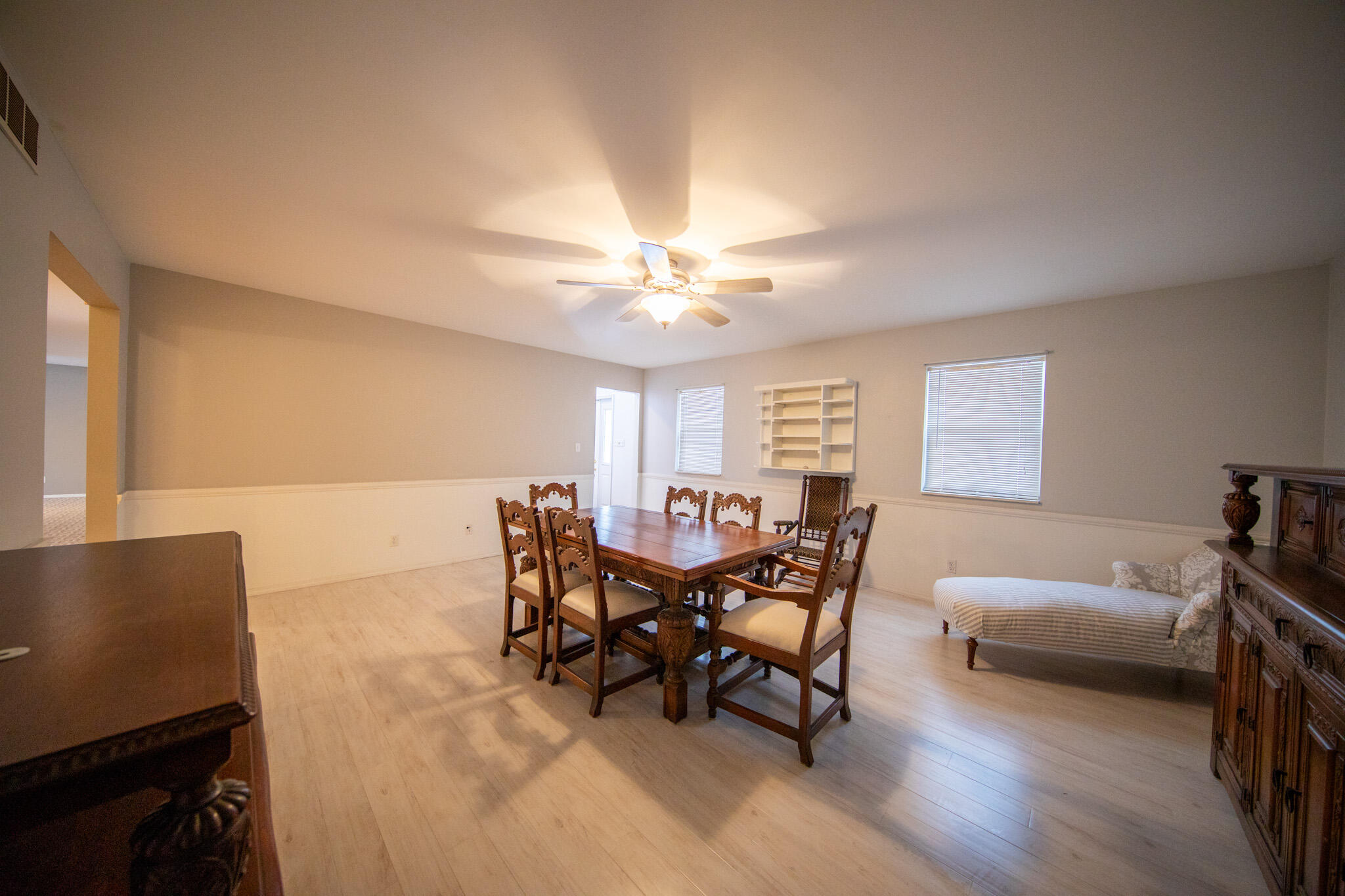 107 Center Street Michigan City, IN 46360 - Photo 20 of 67 a view of a dining room with furniture and chandelier