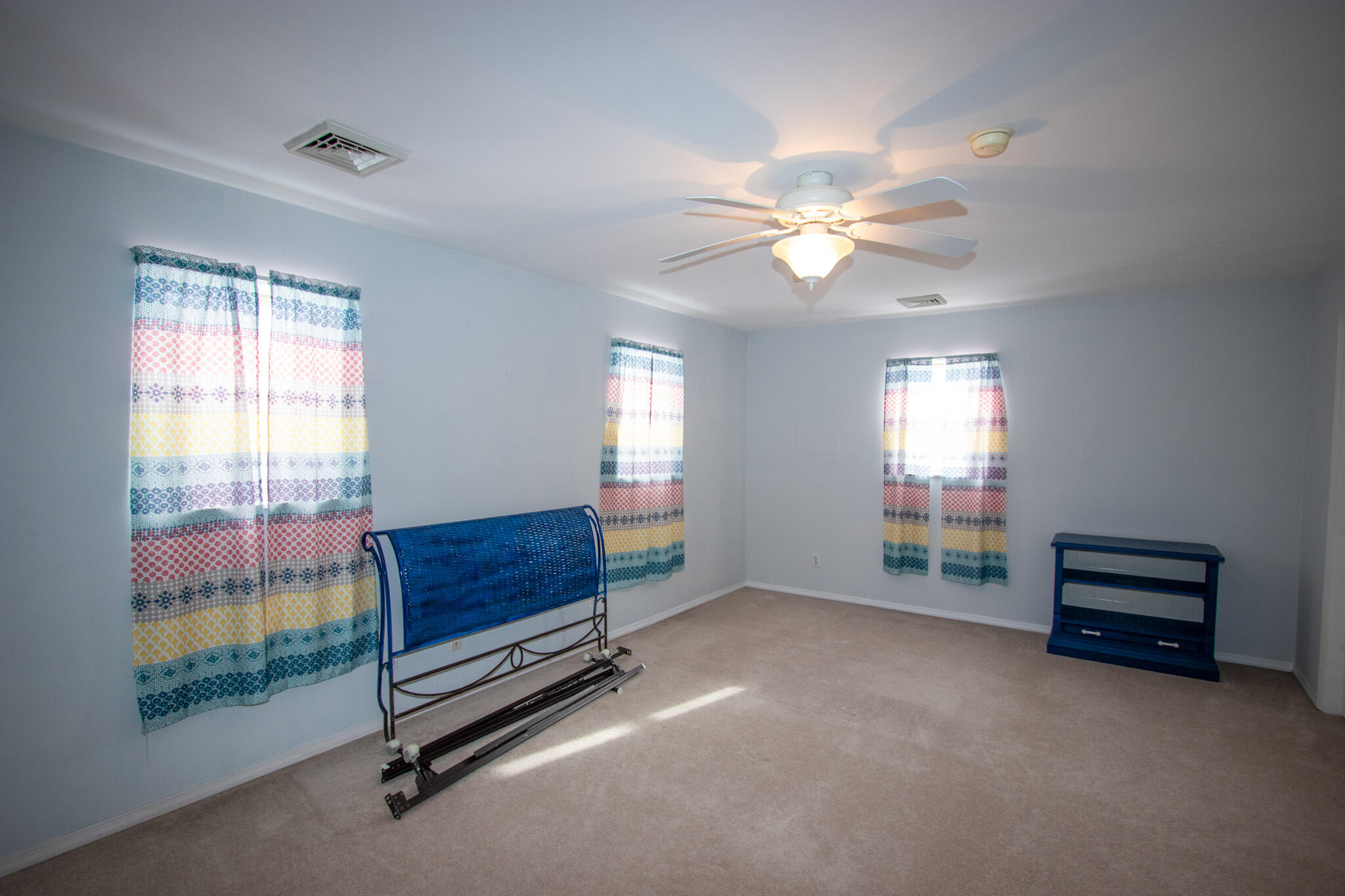 107 Center Street Michigan City, IN 46360 - Photo 48 of 67 a living room with furniture gym equipment and a window