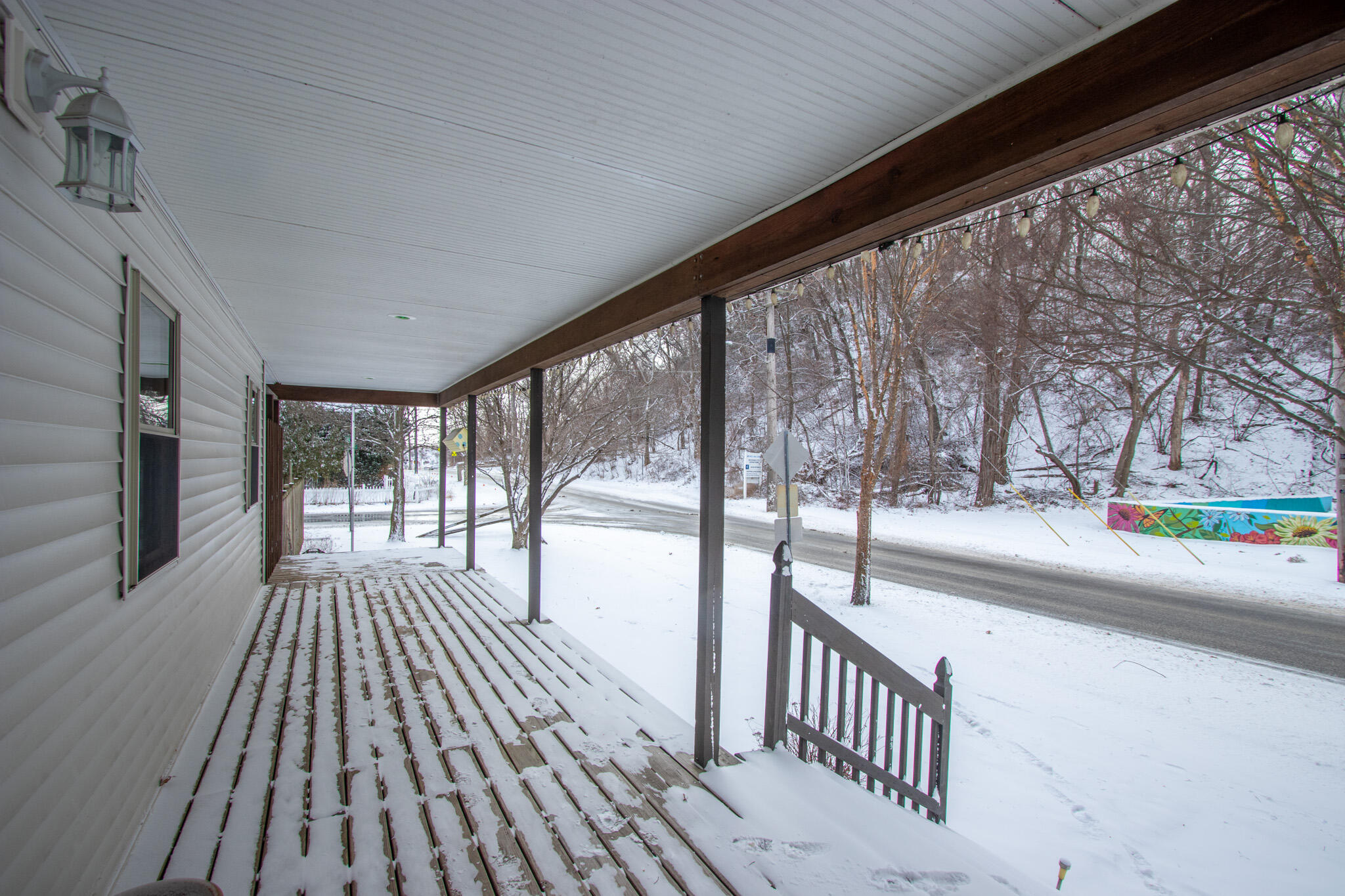 107 Center Street Michigan City, IN 46360 - Photo 59 of 67 a view of a porch and wooden floor