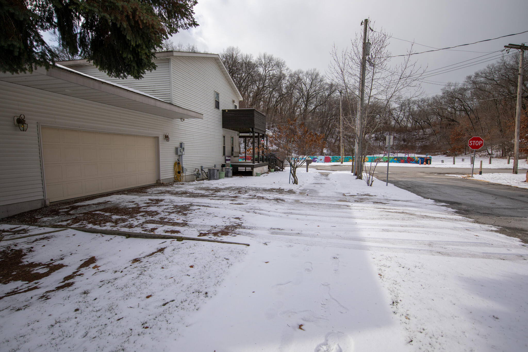 107 Center Street Michigan City, IN 46360 - Photo 64 of 67 a view of a road with a building in the background