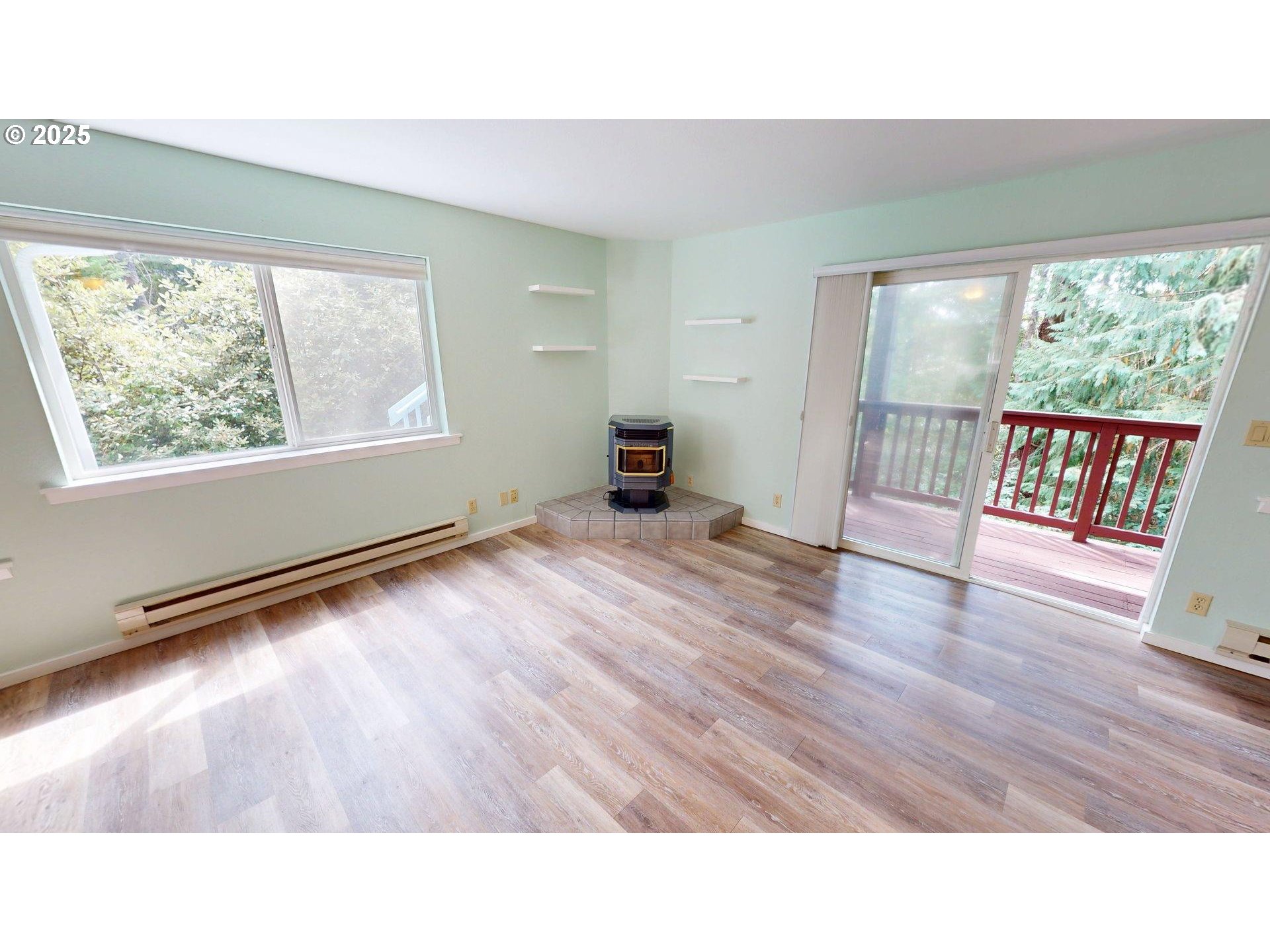 1455 Seacrest Lane, Unit 1A Brookings, OR 97415 - Photo 12 of 32 a kitchen with a window and wooden floor