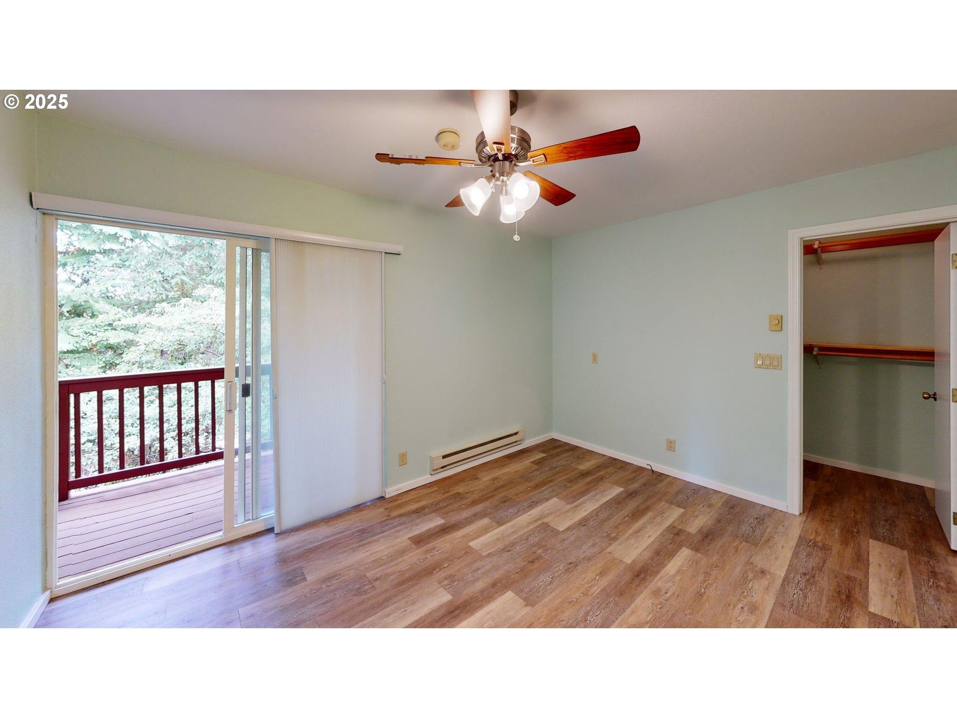 1455 Seacrest Lane, Unit 1A Brookings, OR 97415 - Photo 16 of 32 a open hall with wooden floor