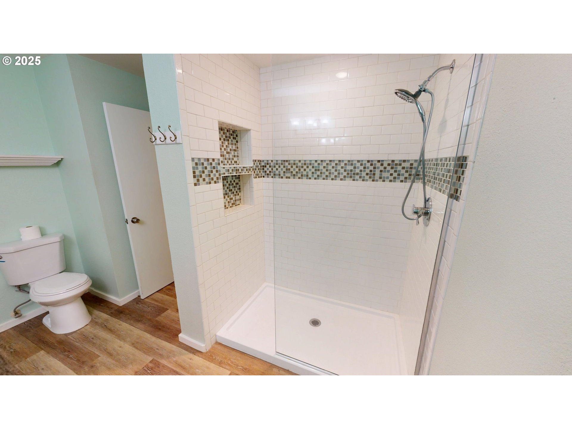 1455 Seacrest Lane, Unit 1A Brookings, OR 97415 - Photo 18 of 32 a bathroom with a sink and a toilet