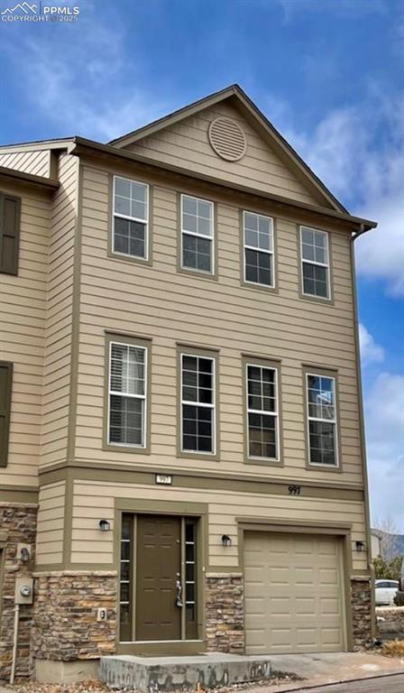 997 Burning Bush Point Monument, CO 80132 - Photo 34 of 34 a front view of a house with a balcony