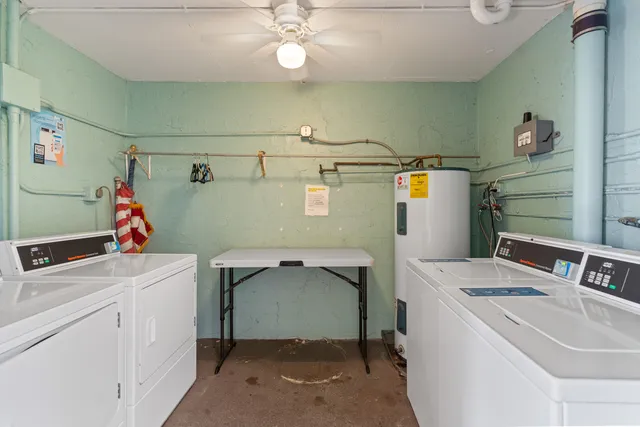 a utility room with dryer and washer
