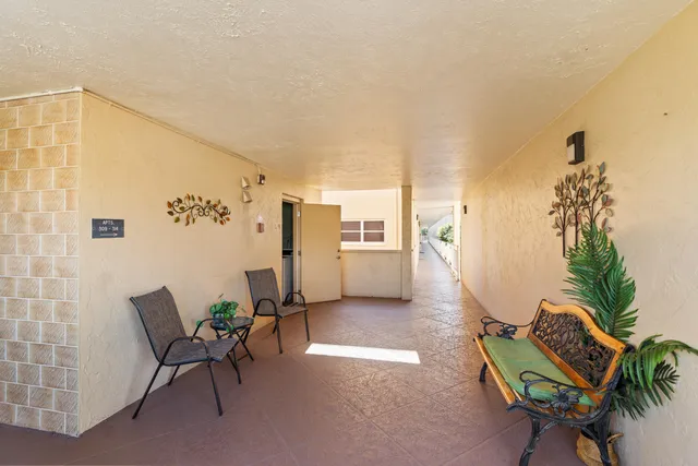 a view of a livingroom with furniture and rug