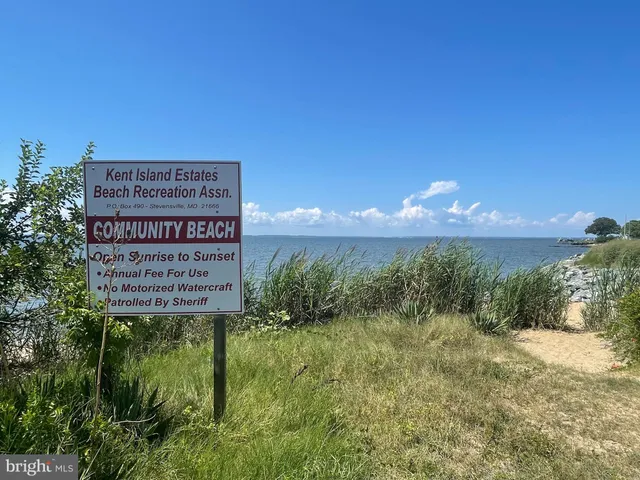 a view of a lake with mountains in the background