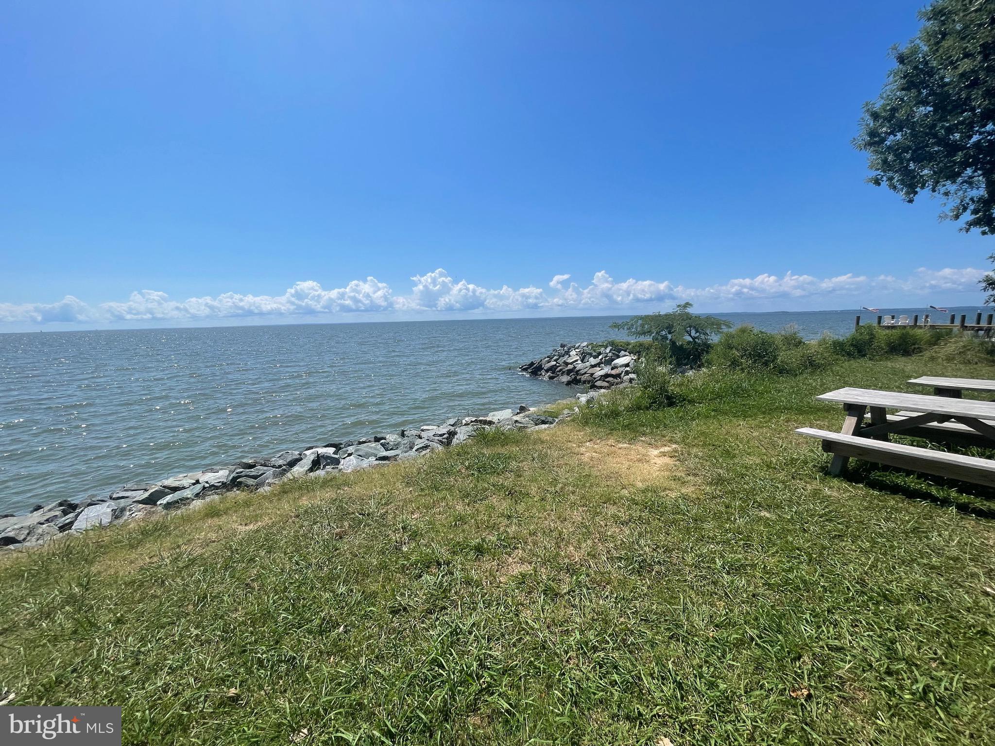 224 Wicomico Road Stevensville, MD 21666 - Photo 22 of 24 a view of a lake with houses in the back