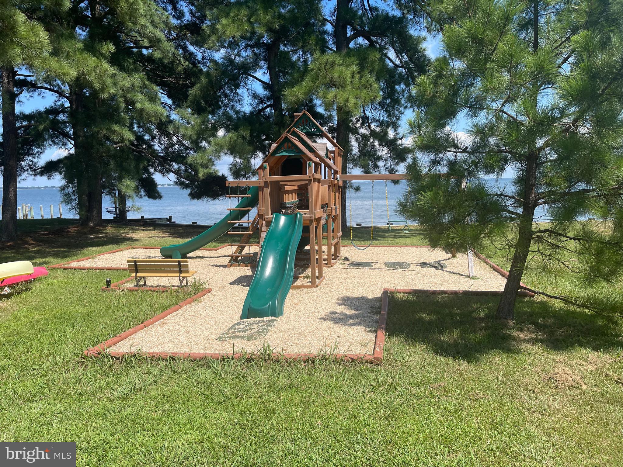 224 Wicomico Road Stevensville, MD 21666 - Photo 8 of 24 a view of a park with large trees