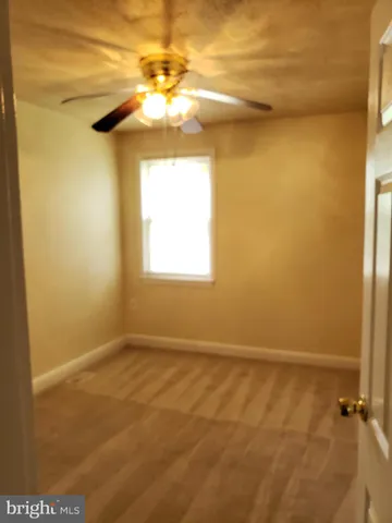 a view of a livingroom with a window