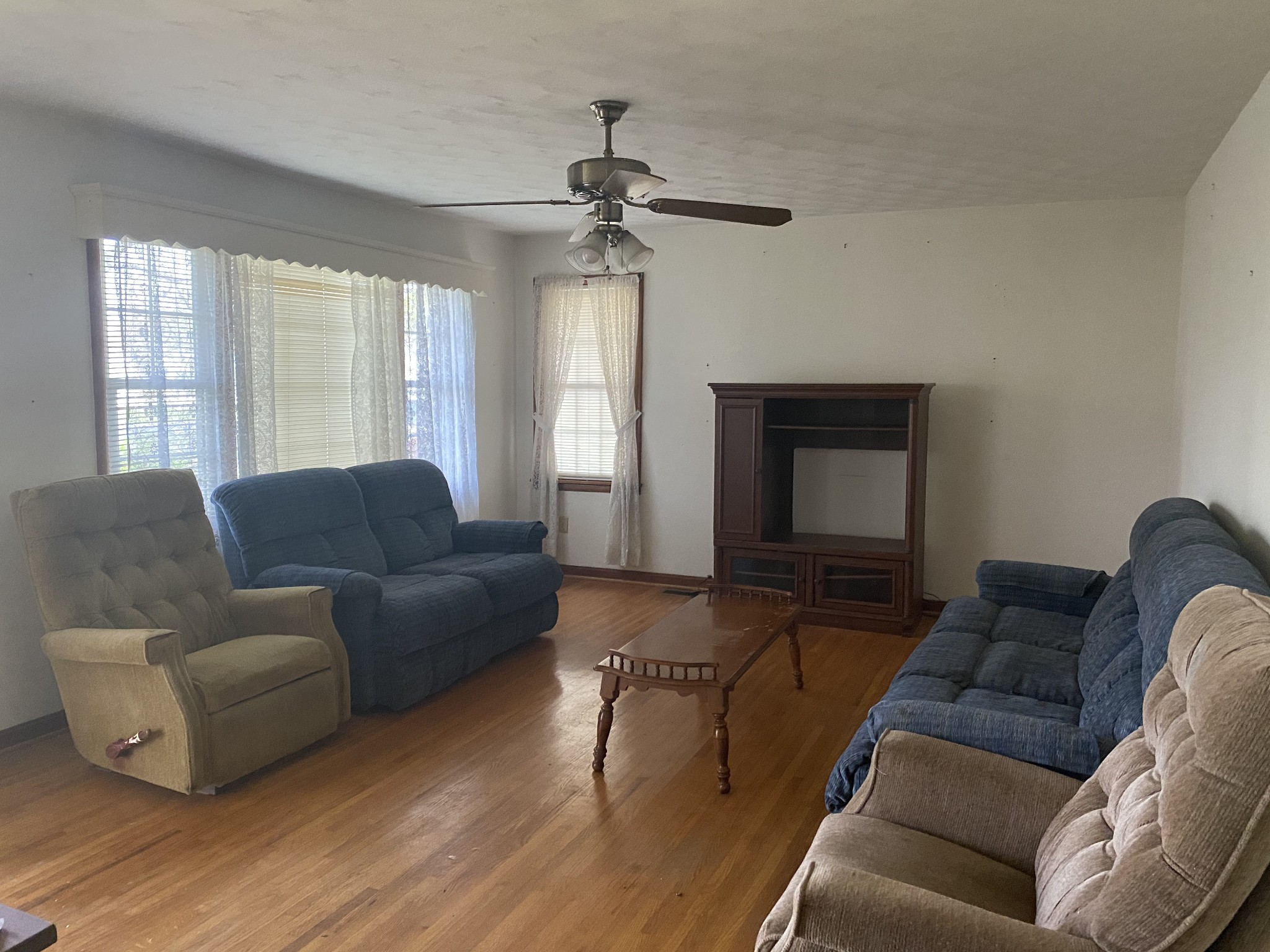 136 New Deal Potts Road Cottontown, TN 37048 - Photo 11 of 24 a living room with furniture and a fireplace