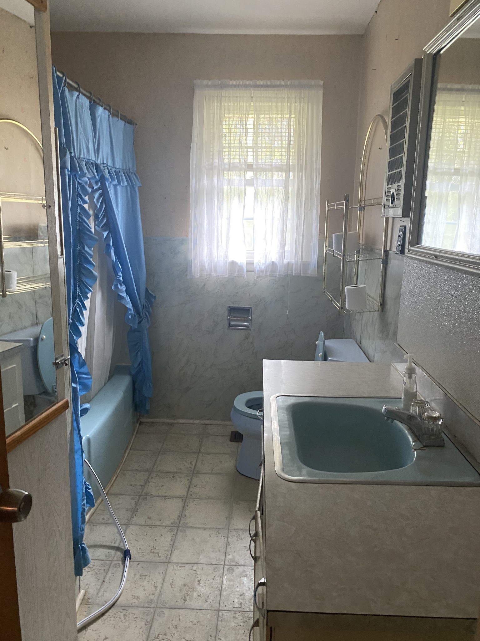 136 New Deal Potts Road Cottontown, TN 37048 - Photo 12 of 24 a bathroom with a sink a toilet and a mirror