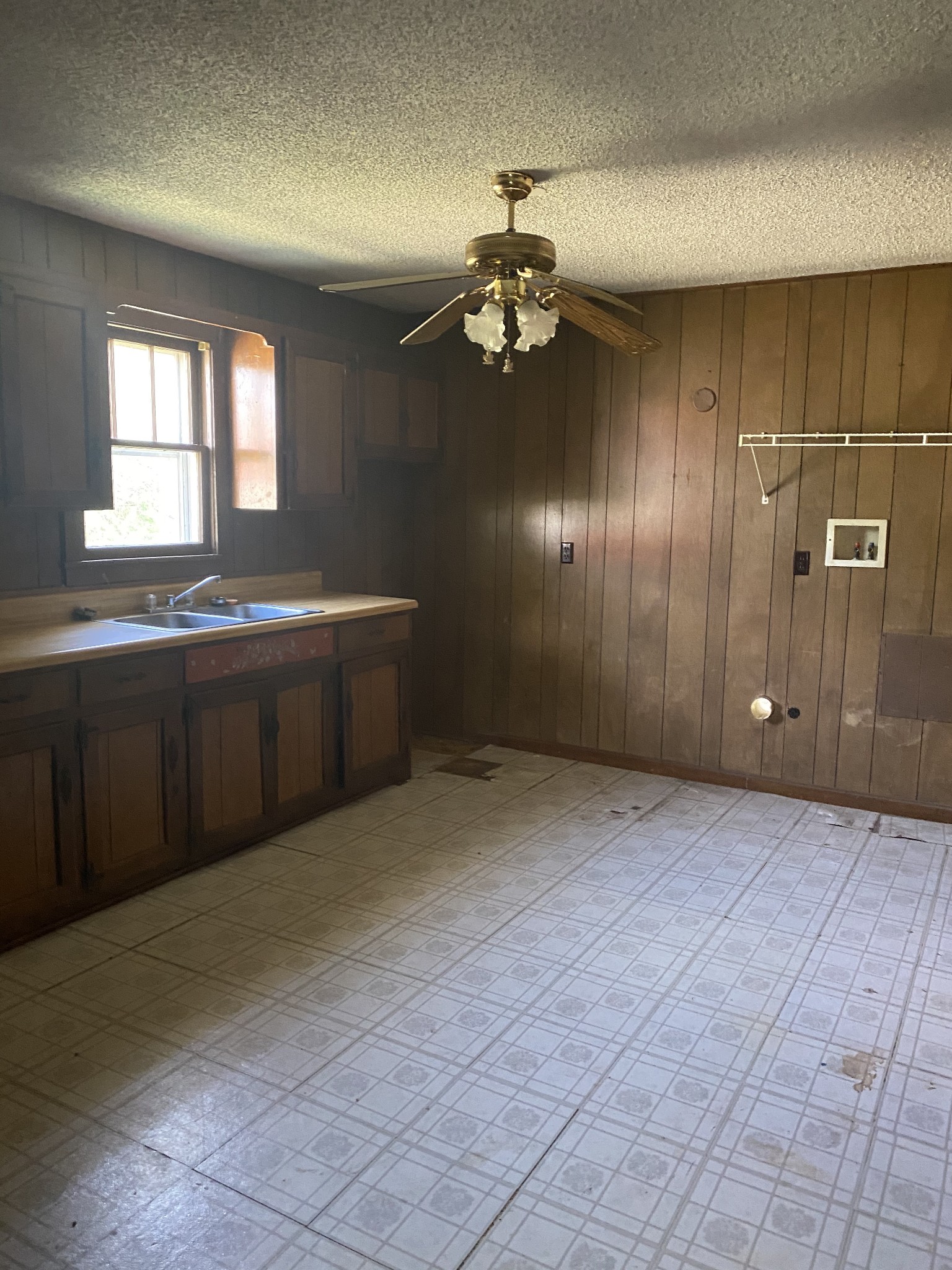 136 New Deal Potts Road Cottontown, TN 37048 - Photo 18 of 24 a view of a kitchen with a sink and chandelier