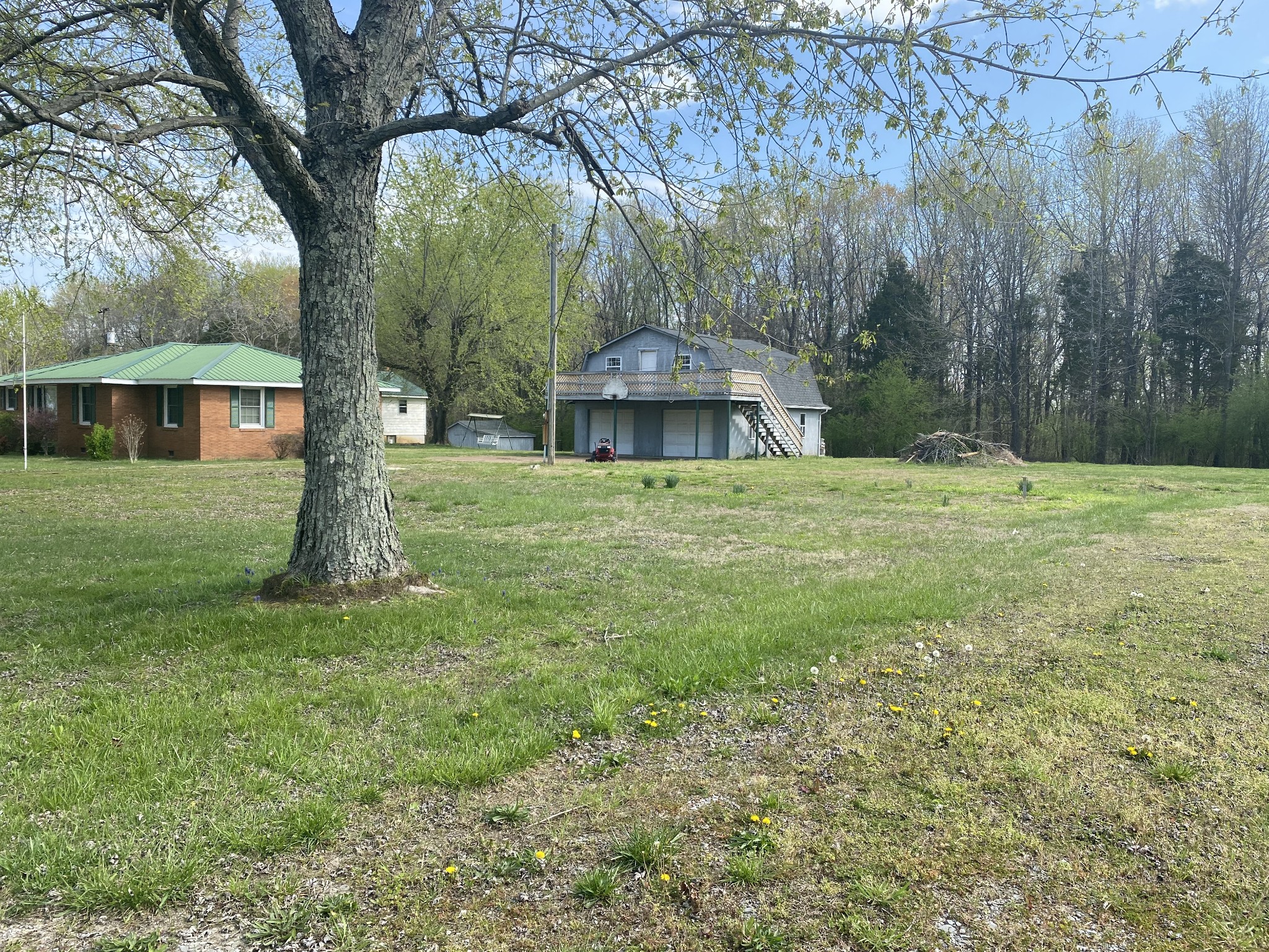 136 New Deal Potts Road Cottontown, TN 37048 - Photo 3 of 24 a view of a house with a yard