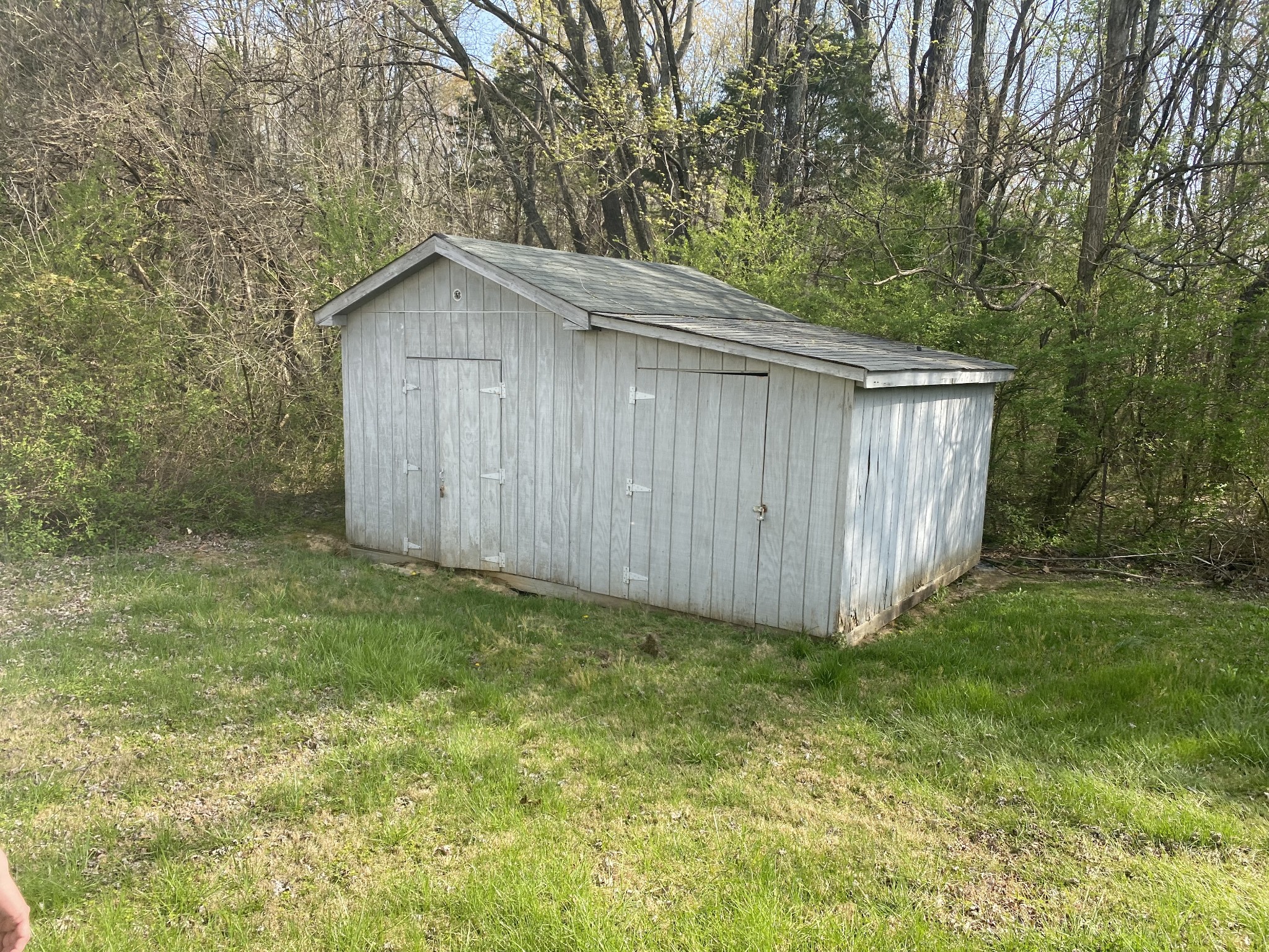 136 New Deal Potts Road Cottontown, TN 37048 - Photo 21 of 24 a wooden house with a yard