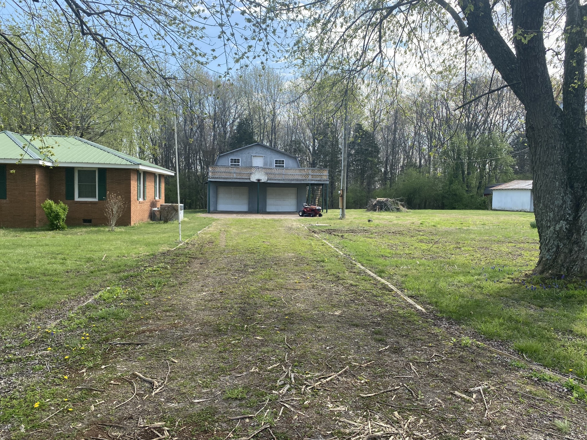 136 New Deal Potts Road Cottontown, TN 37048 - Photo 22 of 24 a front view of a house with a yard