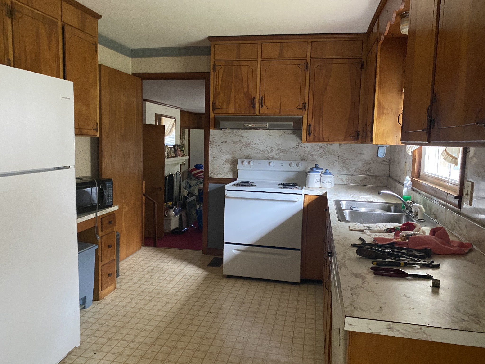 136 New Deal Potts Road Cottontown, TN 37048 - Photo 9 of 24 a kitchen with a refrigerator and a stove