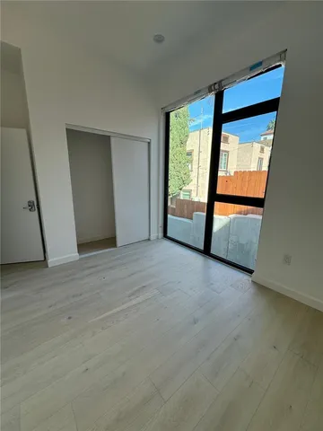 a bathroom with a sink toilet and mirror