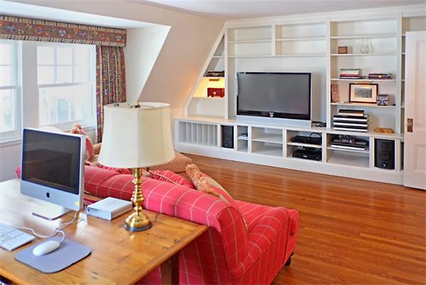 9 Stratford Road Winchester, MA 01890 - Photo 15 of 18 a living room with furniture and a flat screen tv