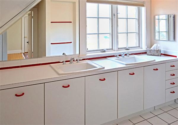 9 Stratford Road Winchester, MA 01890 - Photo 18 of 18 a bathroom with a sink and a window
