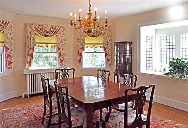 9 Stratford Road Winchester, MA 01890 - Photo 7 of 18 a view of a dining room with furniture window and wooden floor