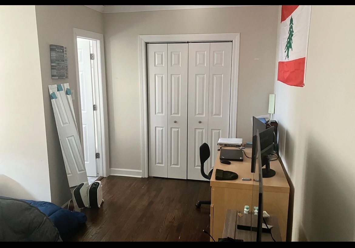 3345 North Marshfield Avenue, Unit 201 Chicago, IL 60657 - Photo 4 of 5 a room with furniture and a window