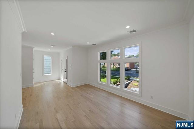 92 Franklin Street Tenafly, NJ 07670 - Photo 13 of 42 wooden floor in an empty room with a window