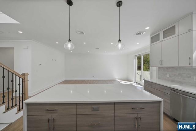 92 Franklin Street Tenafly, NJ 07670 - Photo 16 of 42 a view of a kitchen with a sink and chandelier