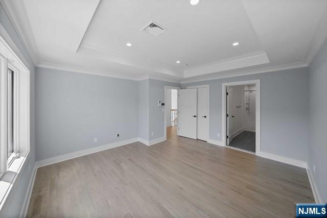 92 Franklin Street Tenafly, NJ 07670 - Photo 28 of 42 wooden floor in an empty room with a window