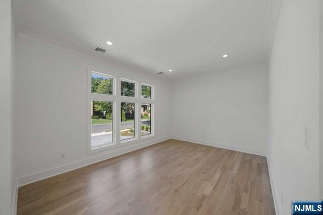 92 Franklin Street Tenafly, NJ 07670 - Photo 4 of 42 an empty room with windows