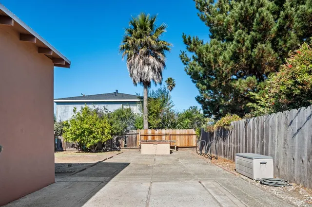 a house view with a garden space