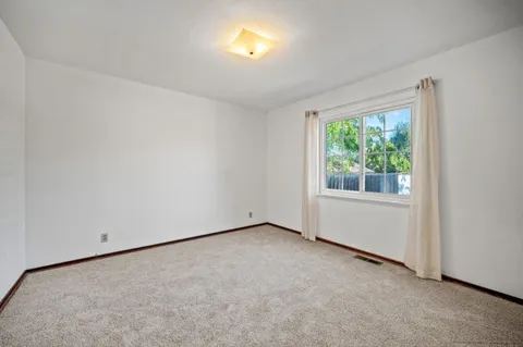 an empty room with a window