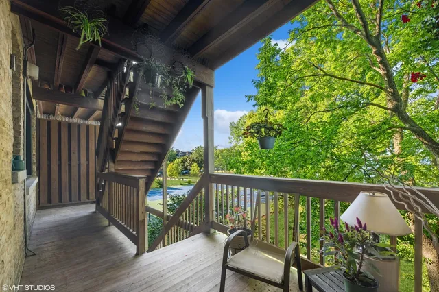 a view of balcony with furniture