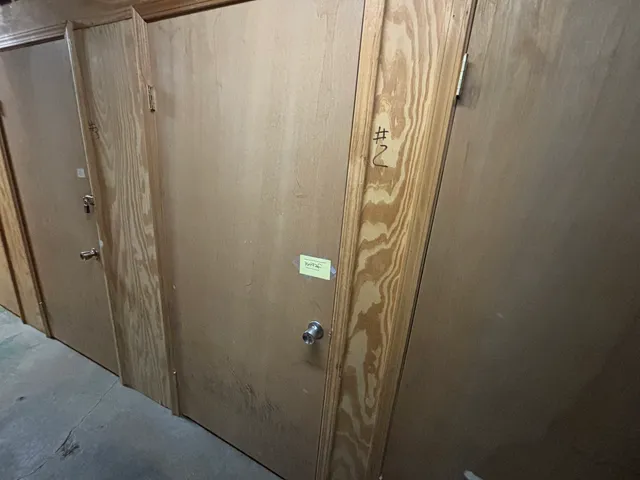 a bathroom with a shower and a window