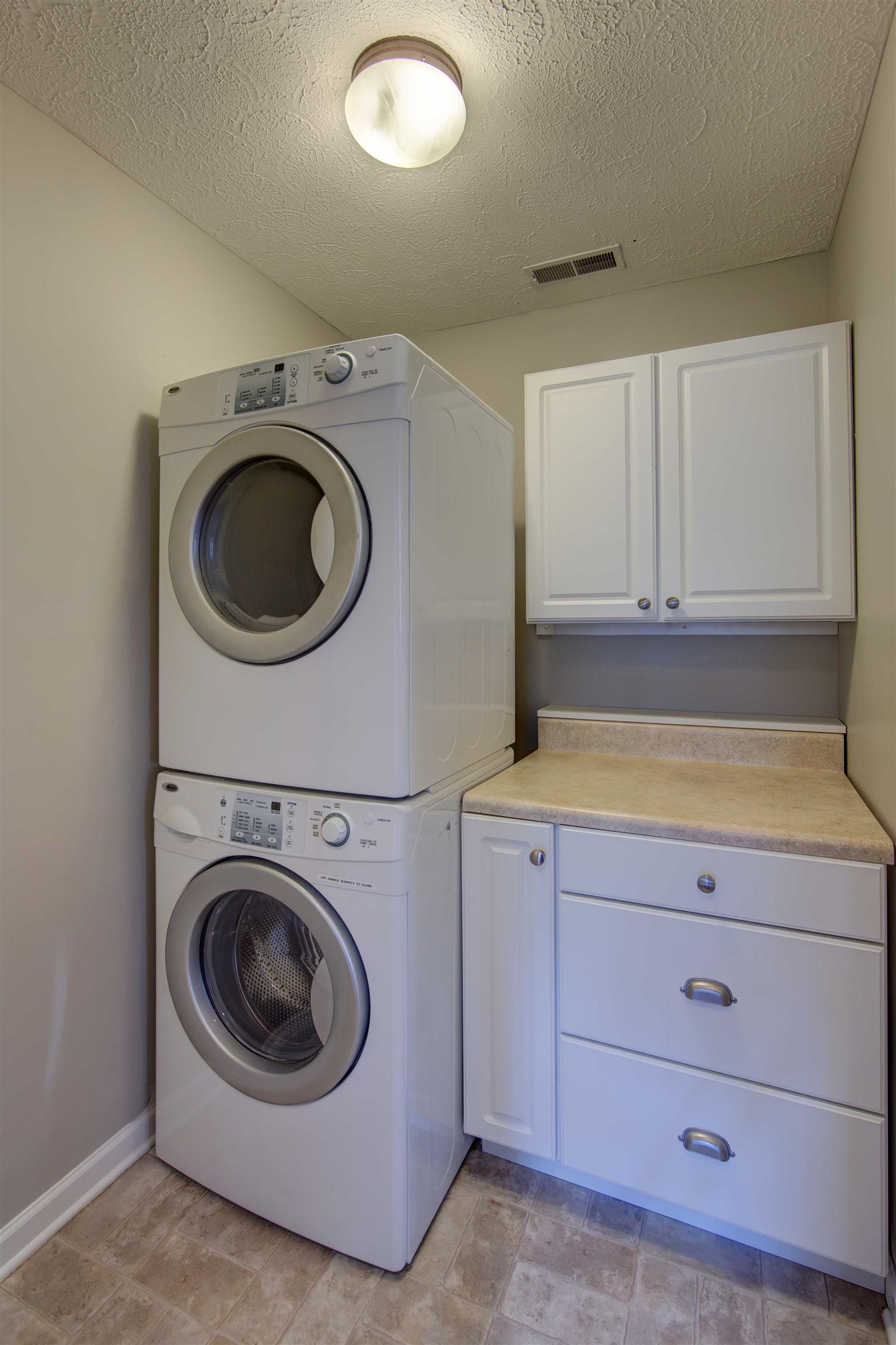 1023 Countess Lane Spring Hill, TN 37174 - Photo 26 of 28 Washer and Dryer Remain. Look at those cabinets!