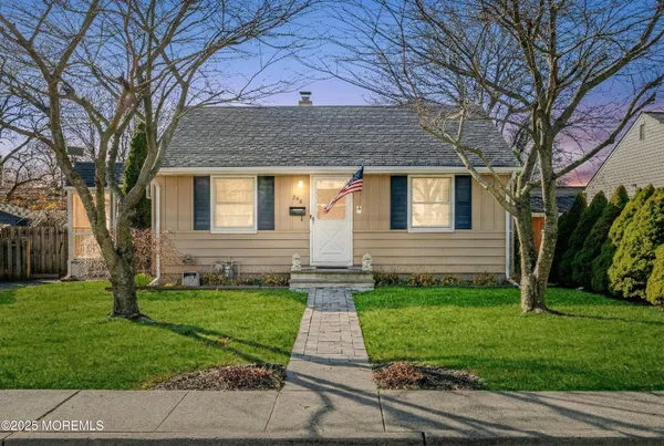 a front view of house with yard
