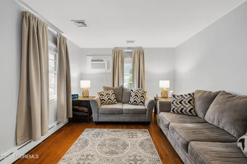 a living room with furniture and a couch