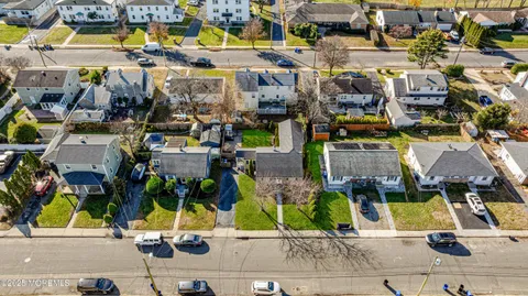 a view of multiple houses with outdoor space