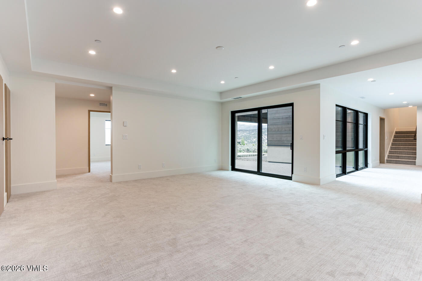 61 New York Mountain Road Eagle, CO 81631 - Photo 16 of 34 Lower Flex Room with Patio access to Cou