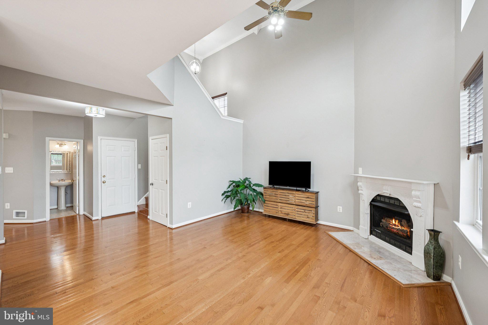 14387 Newbern Loop Gainesville, VA 20155 - Photo 11 of 38 a view of livingroom with furniture and a fireplace
