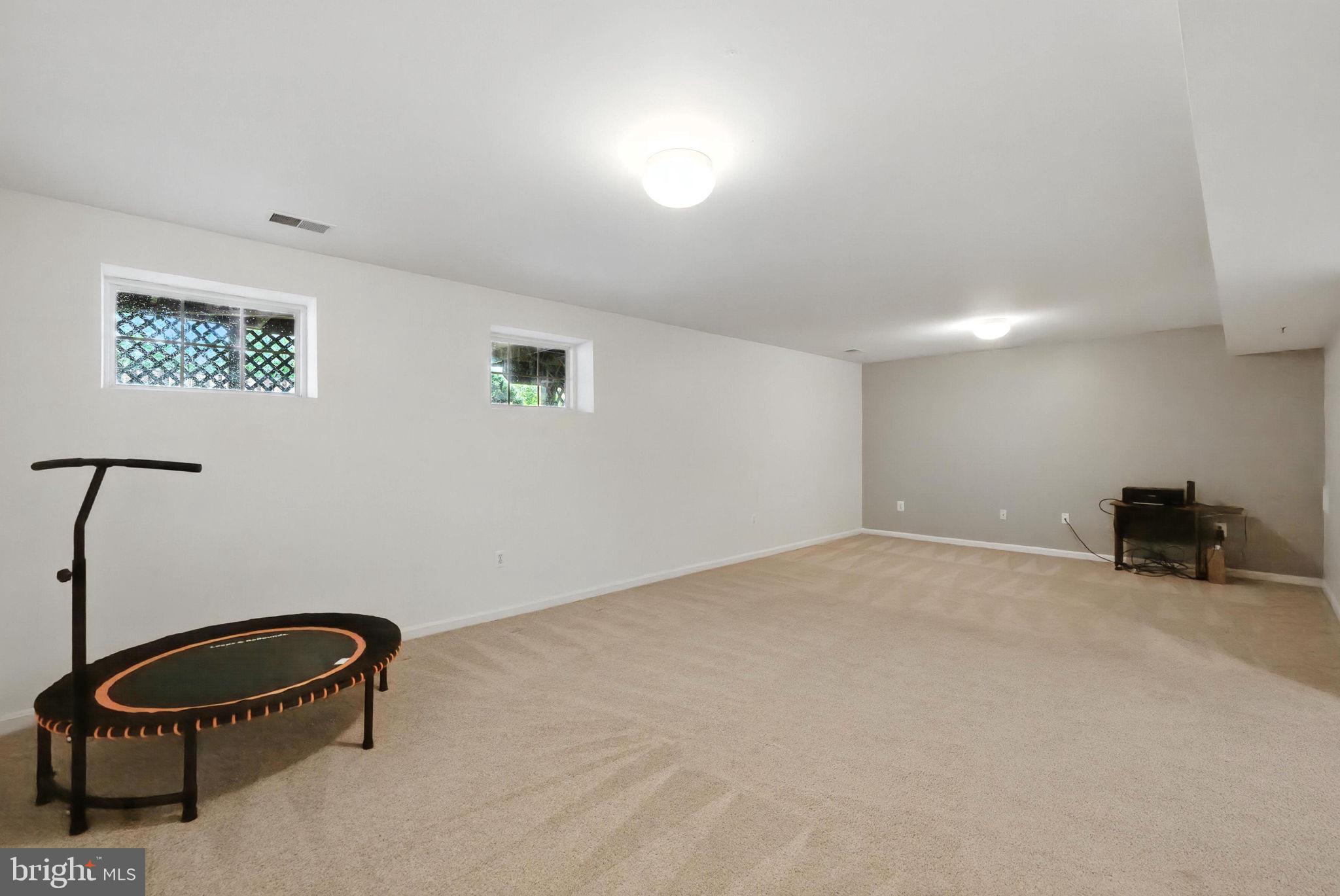 14387 Newbern Loop Gainesville, VA 20155 - Photo 22 of 38 a room with furniture and air hockey table
