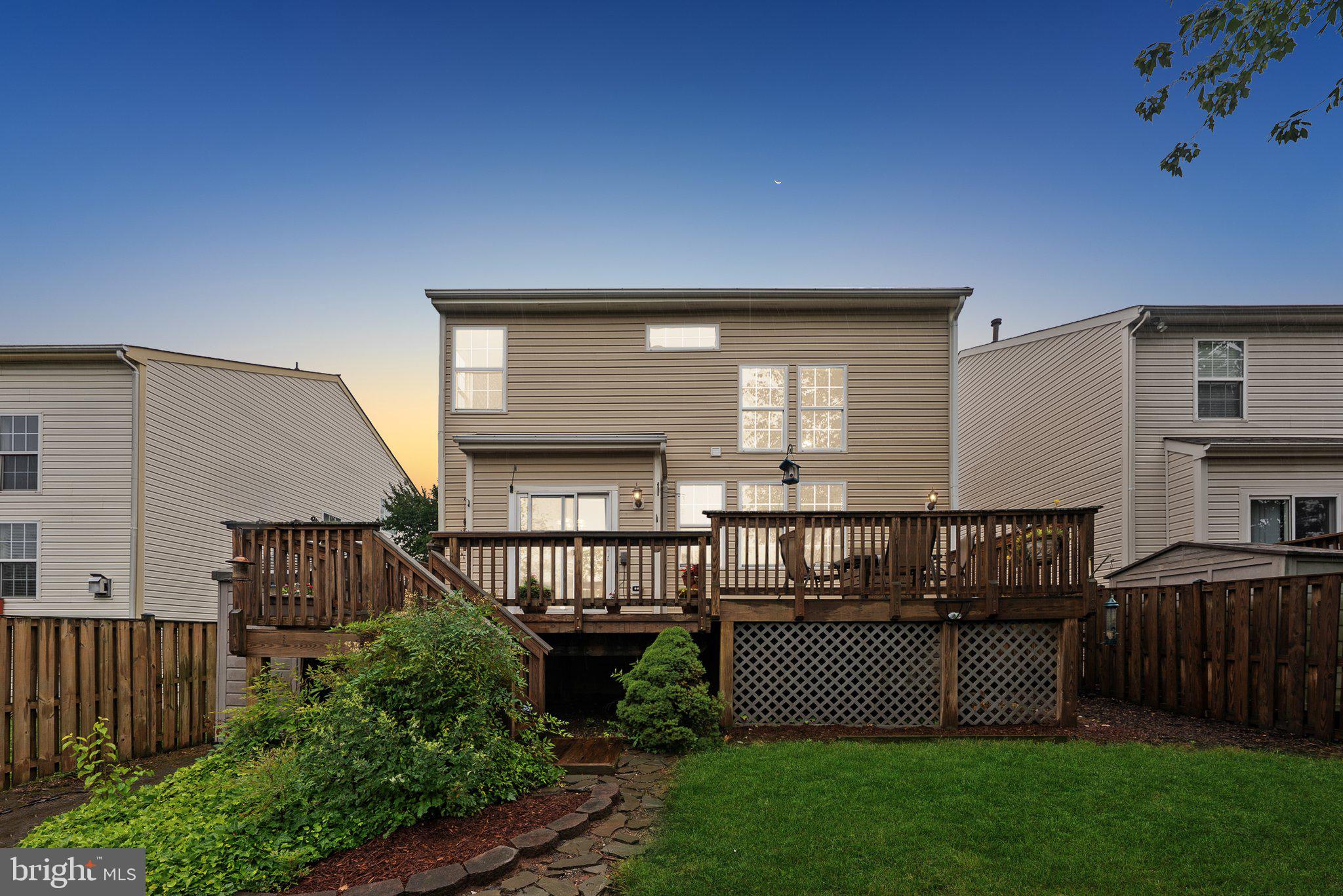 14387 Newbern Loop Gainesville, VA 20155 - Photo 34 of 38 a view of a house with a deck