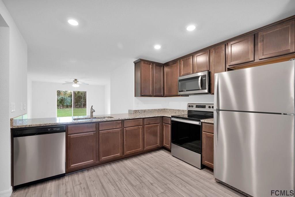 11 Rockefeller Drive Palm Coast, FL 32164 - Photo 3 of 9 Stainless Steel Appliances