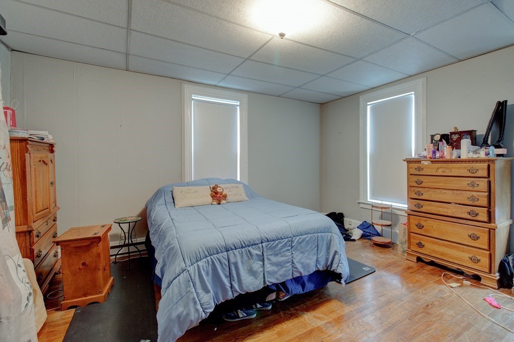 339 Front Street Chicopee, MA 01013 - Photo 13 of 22 a bedroom with a bed and furniture