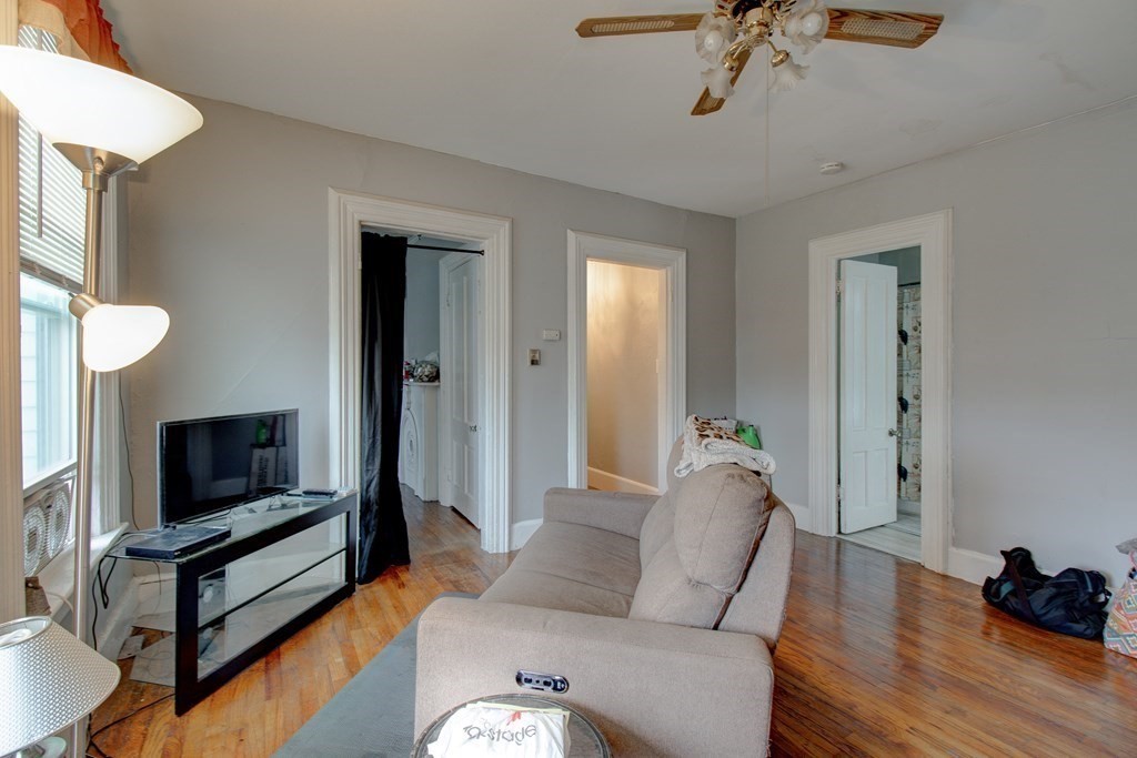 339 Front Street Chicopee, MA 01013 - Photo 14 of 22 a living room with furniture and a flat screen tv