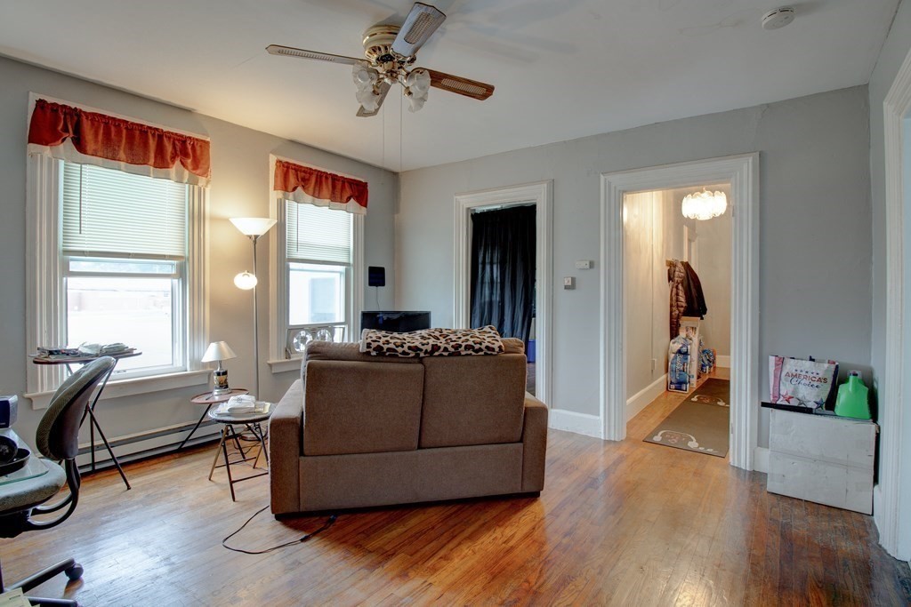 339 Front Street Chicopee, MA 01013 - Photo 15 of 22 a living room with furniture and a wooden floor